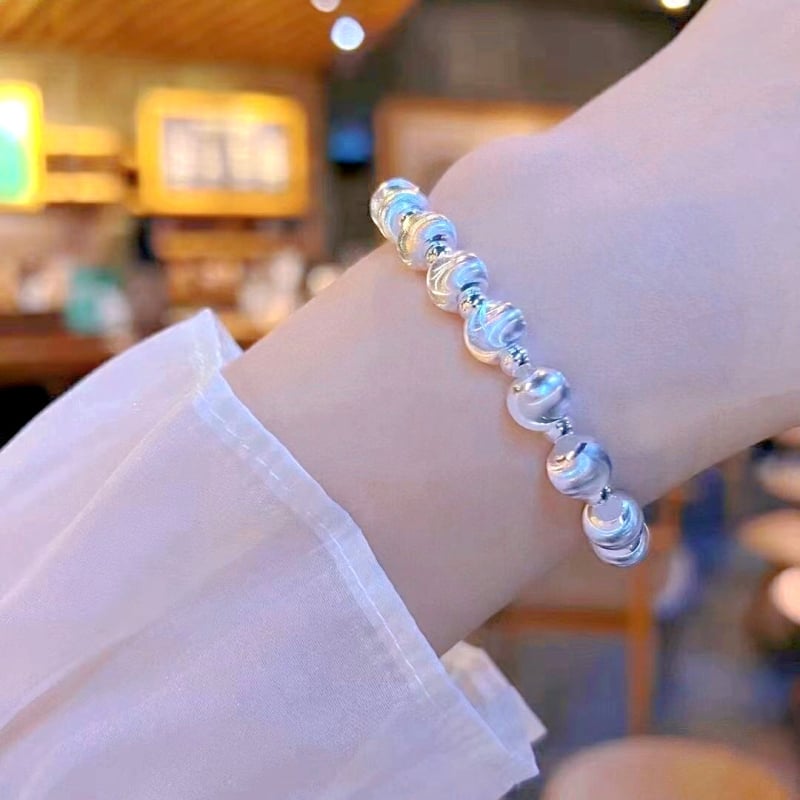 Virágmotívumos, kerek gyöngyökkel és masni fityegővel készült karkötő, réz, elektroplakálás, koreai stílusú nőknek, kézműves ékszer, 2024 tavasz