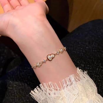 Karkötő kevert anyagokból, elektroplating bevonattal, finom megjelenés, új kínai stílus, tavasz 2025.