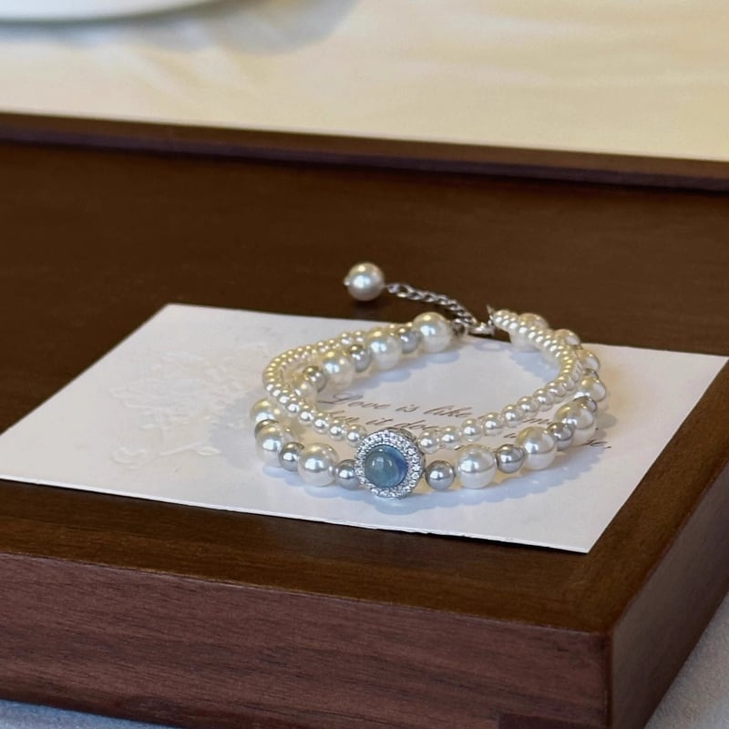 Kétszínű rétegű gyöngy karkötő, geometriai mintával a Mother buddha márkától, nőknek, könnyű luxus stílus (Anyag: gyöngy; Feldolgozás: elektroplattálás; Stílus: nők)