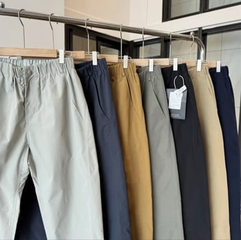 Munka- és városi szabadidő nadrág keskenyedő szárú, magas derék, poliészter anyag, egyszínű