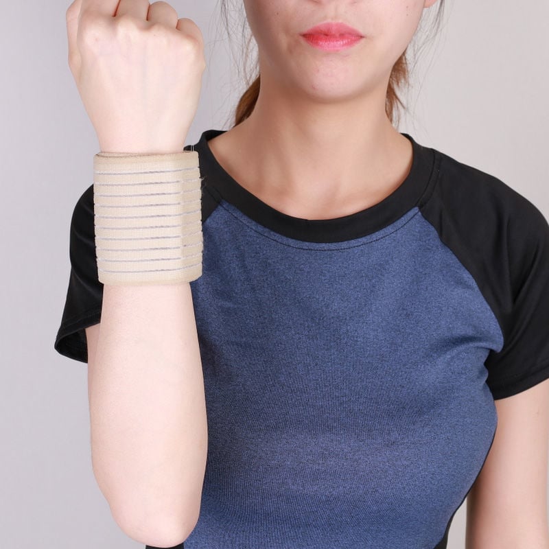 Edzéshez tervezett csuklóvédő — kompressziós, elasztikus csuklópánt, könnyű, poliészter rost, univerzális illeszkedés