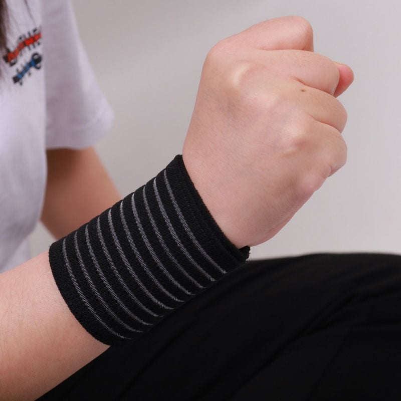 Edzéshez tervezett csuklóvédő — kompressziós, elasztikus csuklópánt, könnyű, poliészter rost, univerzális illeszkedés