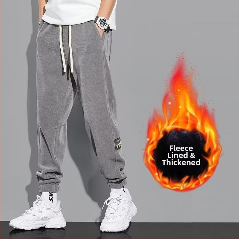 Férfi sportnadrág fleece belsővel, bokához kötős dizájn, középmagas derék, egyenes szabás, pamut-poliészter keverék