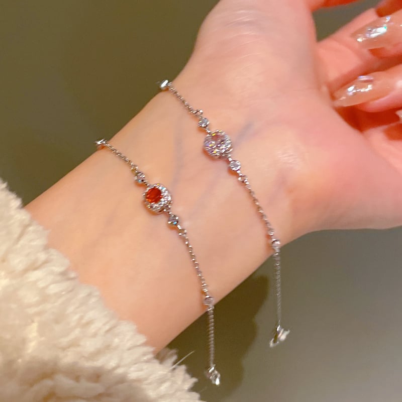 Négyszög alakú karkötő fényes dizájnnal; réz alapanyag; valódi arany bevonat; női, koreai stílus; Qiao xiya márka.