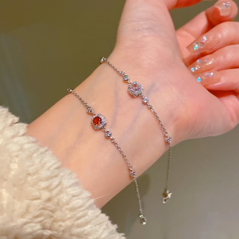 Négyszög alakú karkötő fényes dizájnnal; réz alapanyag; valódi arany bevonat; női, koreai stílus; Qiao xiya márka.