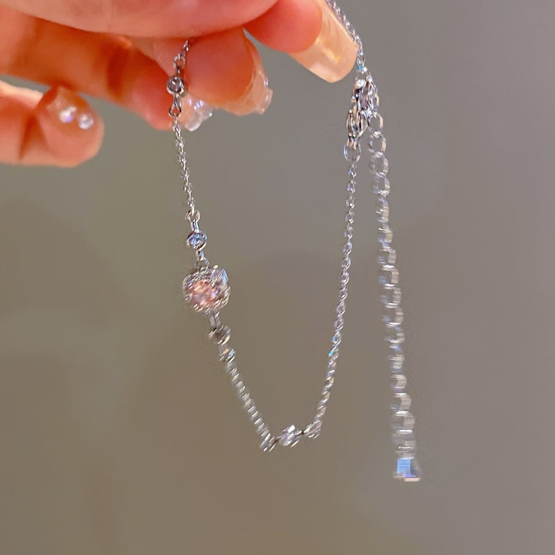 Négyszög alakú karkötő fényes dizájnnal; réz alapanyag; valódi arany bevonat; női, koreai stílus; Qiao xiya márka.