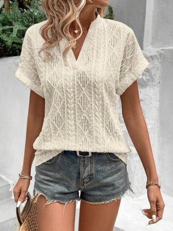 Geometriai jacquard blúz V-nyakú, rövid ujjú, poliészter-spandex keverék