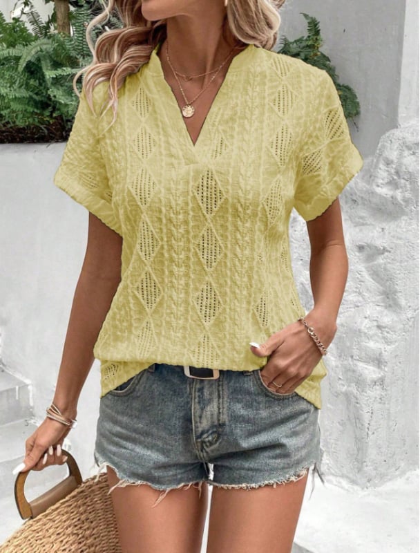 Geometriai jacquard blúz V-nyakú, rövid ujjú, poliészter-spandex keverék