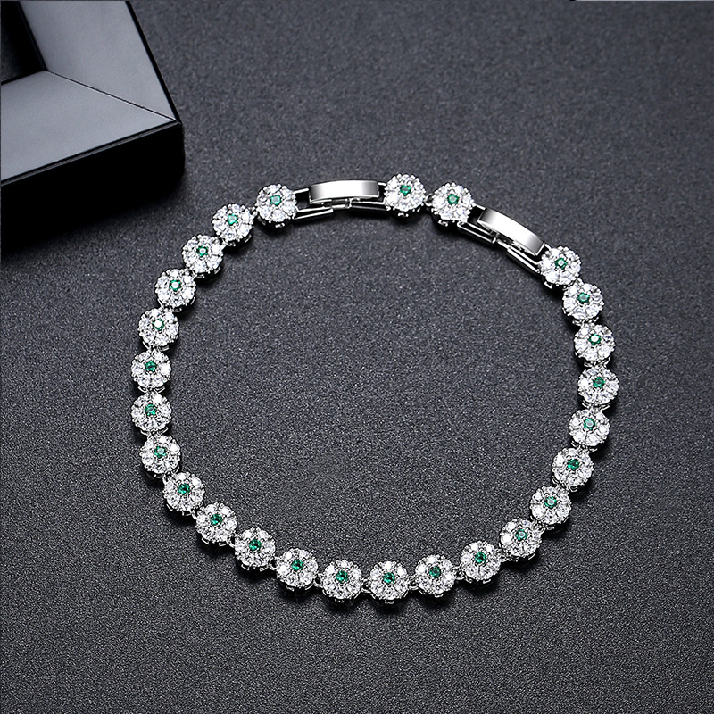 Női karkötő virágmotívummal, mikrobeült cirkóniákkal, teniszlánccal, dupla csattal