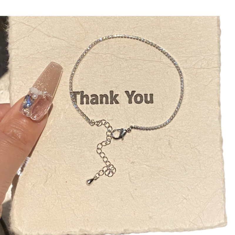 Titániumacél karkötő cirkóniákkal, elektroplattált, női eredeti dizájn