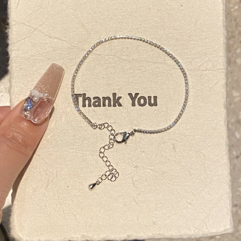 Titániumacél karkötő cirkóniákkal, elektroplattált, női eredeti dizájn