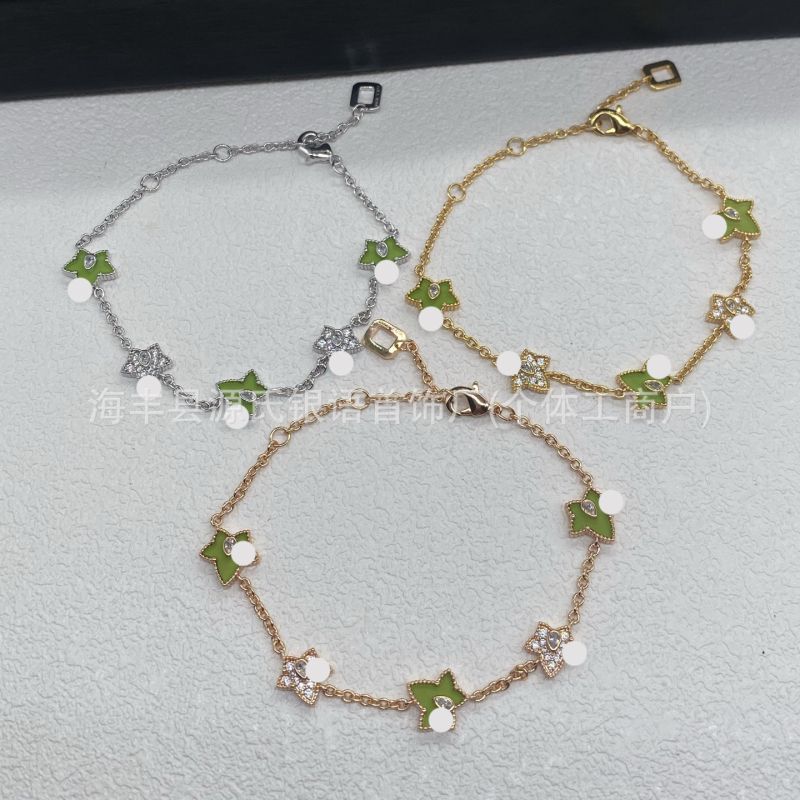 Női ötfélel leveles borostyán karkötő — aranyozott sárgaréz, valódi aranyozás, csepp alakú, tömeg 10