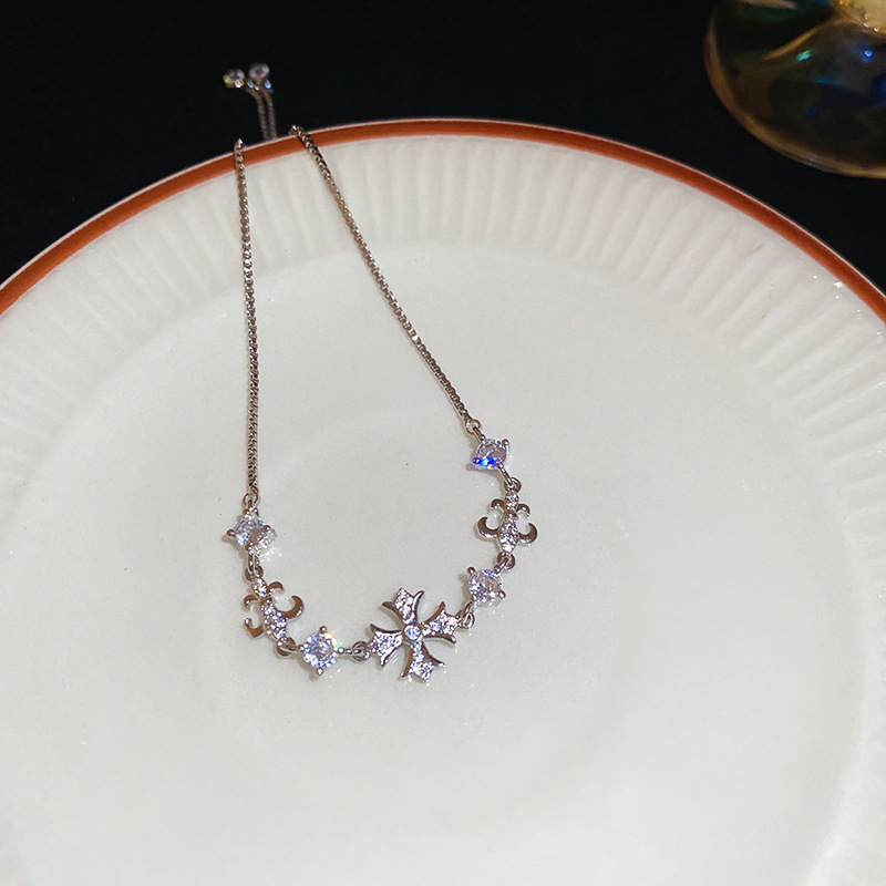 Állítható cirkónia hópehely kereszt gyöngy karkötő – geometrikus retro női ékszer