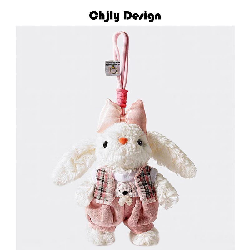 Plüss táskadísz nyúl hosszú fülű – gyerekes mesés stílus, állatmintás, dekoráció, téli 2025 kiadás