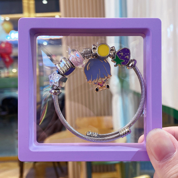 Uniszex karkötő ötvözetből, kézzel készített gyöngyökkel, rajzfilmfigurák motívummal, divatos kézrevaló kiegészítő, tél 2025