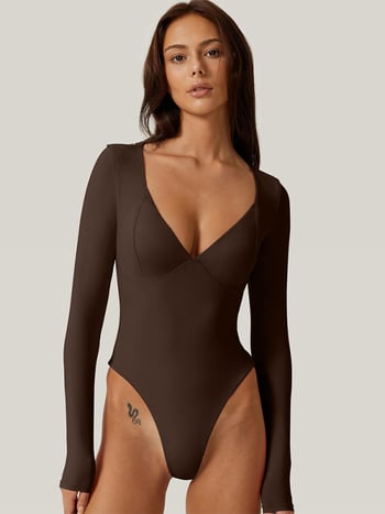 Балетно боди с дълги ръкави, V-образно деколте, едночастово, полиестер с найлон 80%, подплата спандекс 75%