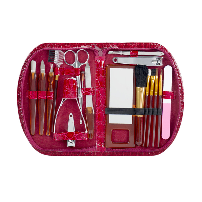 Set kozmetičkih alata s četkom za puder, alatom za usne, kliješta za nokte, trimer za obrve i četkom za čišćenje; materijali: PS, PVC, 2Cr13, nehrđajući čelik, aluminij; OEM; neto masa 240 g; pakiranje 60 komada