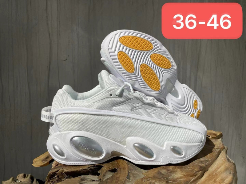 Kanvasz felsőrésszel rendelkező futócipő, középmagass kivitel, kúpos sarokkal és injektált talppal.