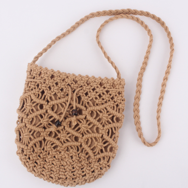 Geantă crossbody țesută manual din fir de bumbac, cu aspect din pai, formă cilindrică