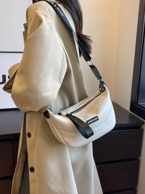 Τσαντάκι crossbody τύπου dumpling, PU υλικό, κλείσιμο με φερμουάρ, επένδυση από πολυεστέρα, μονός ιμάντας