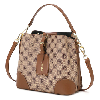 Τσαντάκι bucket από PVC με πλατιά ιμάντα crossbody, μαγνητικό κλείσιμο, εσωτερικές τσέπες: κρυφή τσέπη με φερμουάρ, τσέπη για κινητό, τσέπη για ταυτότητα — Roland Sibao, Καλοκαίρι 2024