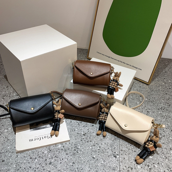 Ženska cilindrična torba od PU-a, street style, magnetsko zatvaranje, unutarnje džepove za telefon i ziptorbu, horizontalni kvadratni oblik