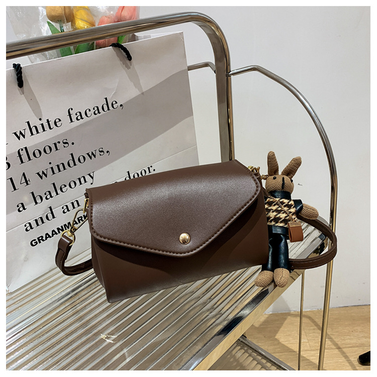 Ženska cilindrična torba od PU-a, street style, magnetsko zatvaranje, unutarnje džepove za telefon i ziptorbu, horizontalni kvadratni oblik