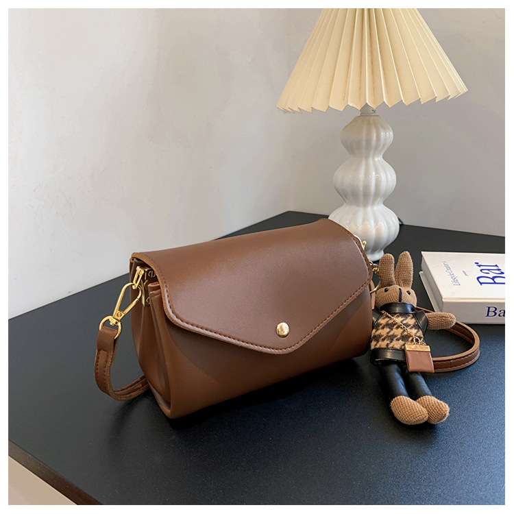 Ženska cilindrična torba od PU-a, street style, magnetsko zatvaranje, unutarnje džepove za telefon i ziptorbu, horizontalni kvadratni oblik