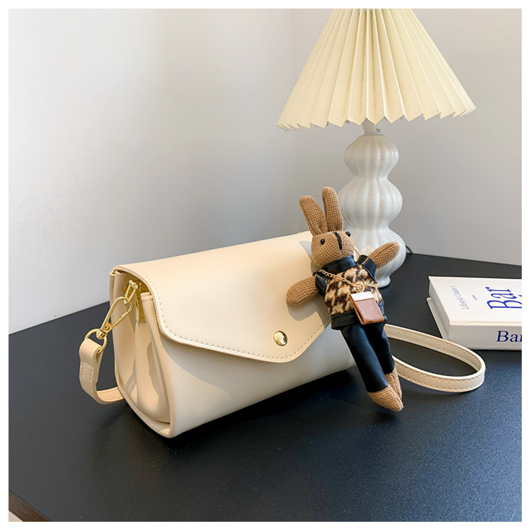 Ženska cilindrična torba od PU-a, street style, magnetsko zatvaranje, unutarnje džepove za telefon i ziptorbu, horizontalni kvadratni oblik