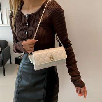 Ženska torba preko ramena, cilindričnog oblika, PU materijal, podstava od sintetičke kože, zatvaranje zipom, jedna naramenica, gradski minimalistički stil