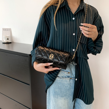 Ženska torba preko ramena, cilindričnog oblika, PU materijal, podstava od sintetičke kože, zatvaranje zipom, jedna naramenica, gradski minimalistički stil