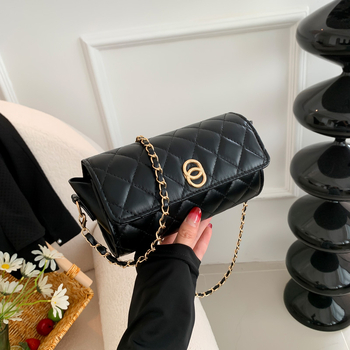 Ženska torba preko ramena, cilindričnog oblika, PU materijal, podstava od sintetičke kože, zatvaranje zipom, jedna naramenica, gradski minimalistički stil