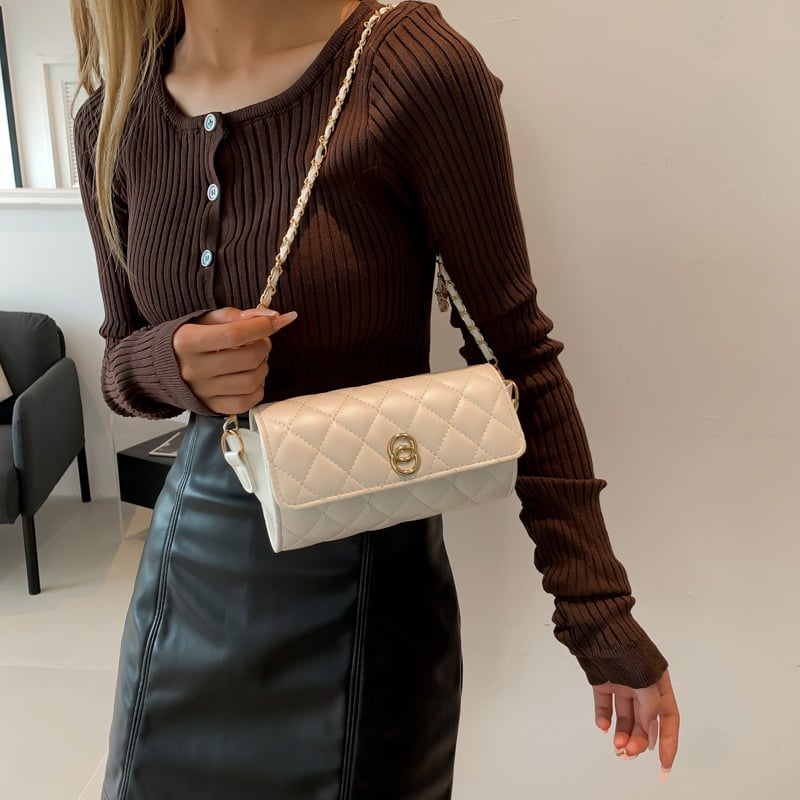 Ženska torba preko ramena, cilindričnog oblika, PU materijal, podstava od sintetičke kože, zatvaranje zipom, jedna naramenica, gradski minimalistički stil