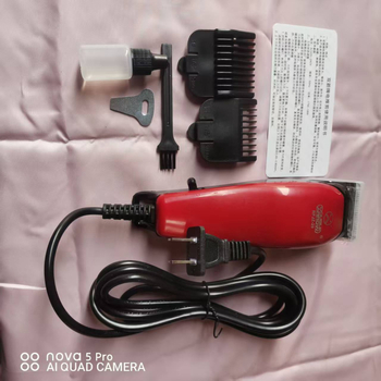 Kablinski električni kliper za kosu, model 29, crveni; napajanje iz mreže, četkasti motor, nehrđajuće čelične oštrice, snaga 18W, odvojiva i periva glava za rezanje