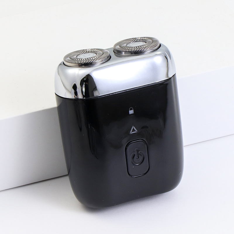 Mali električni brijač, potpuno perivi za cijelo tijelo, 2 rotacijske glave, mokro i suho brijanje, 60-min baterija, punjenje 1 sat