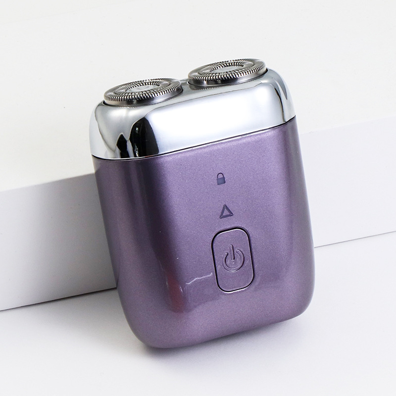 Mali električni brijač, potpuno perivi za cijelo tijelo, 2 rotacijske glave, mokro i suho brijanje, 60-min baterija, punjenje 1 sat