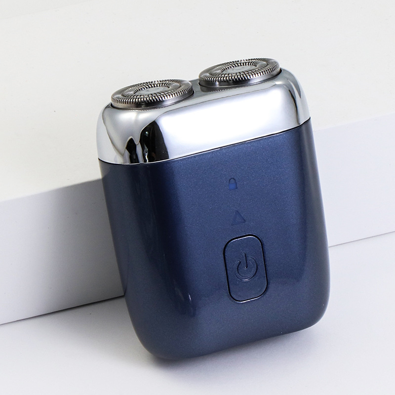 Mali električni brijač, potpuno perivi za cijelo tijelo, 2 rotacijske glave, mokro i suho brijanje, 60-min baterija, punjenje 1 sat