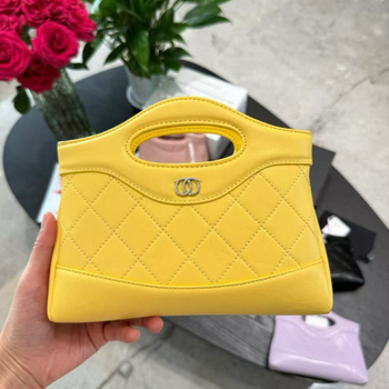 Unisex kožna crossbody torba cilindričnog oblika, zatvaranje preklopom, platnena podstava, unutarnja džep sa zipom