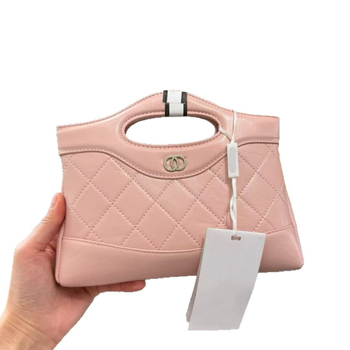 Unisex kožna crossbody torba cilindričnog oblika, zatvaranje preklopom, platnena podstava, unutarnja džep sa zipom