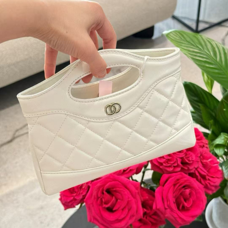 Unisex kožna crossbody torba cilindričnog oblika, zatvaranje preklopom, platnena podstava, unutarnja džep sa zipom