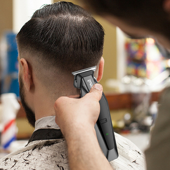 RESUXI 389-es elektromos hajvágó brús motorral, rozsdamentes acél vágófej, beépített 500–800 mAh akkumulátor, töltés üzemmód, 1–3 óra üzemidő