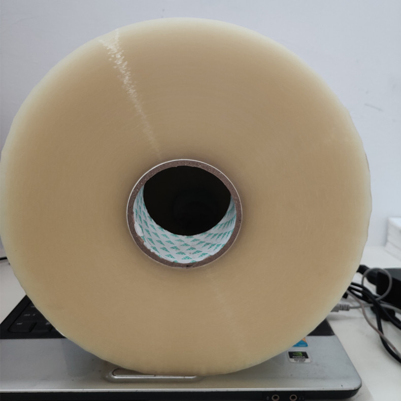 Gépzáró csomagoló szalag, 52 μm vastagság, BOPP alapú, hot-melt ragasztó, sorozat: Gépekhez való szalag, hőmérséklet-tűrés 10–35°C