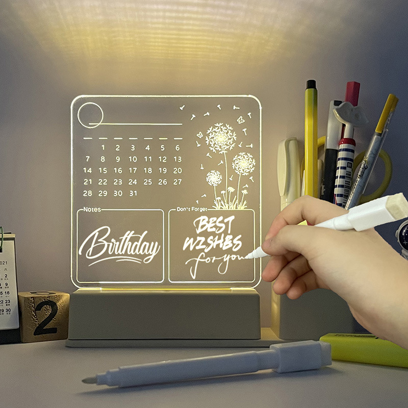 Műanyag négyzet alakú jegyzettábla fénylő naptárral, tolltartóval és törölhető fehér táblával