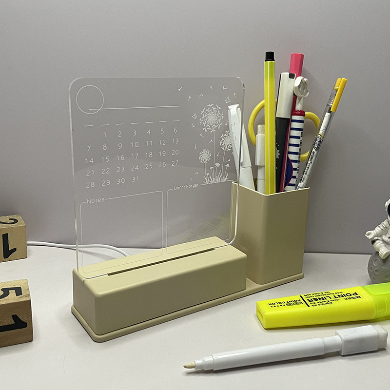 Műanyag négyzet alakú jegyzettábla fénylő naptárral, tolltartóval és törölhető fehér táblával