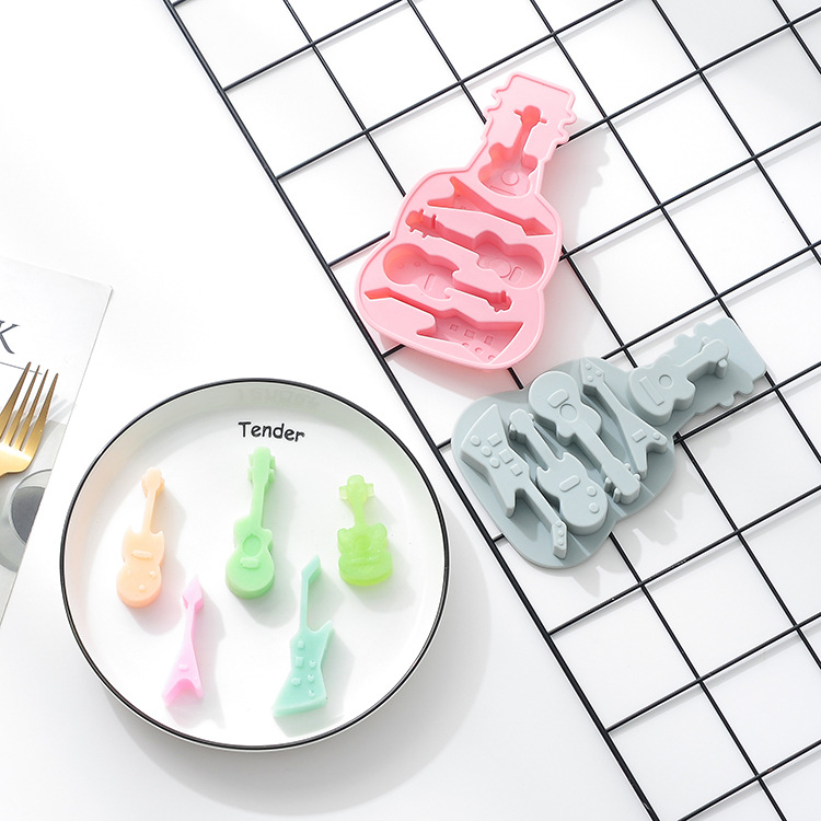 Gitár alakú szilikon sütőforma – csokoládé és sütemények (Anyag: szilikon; Használat: sütés; Kategória: sütőformák)