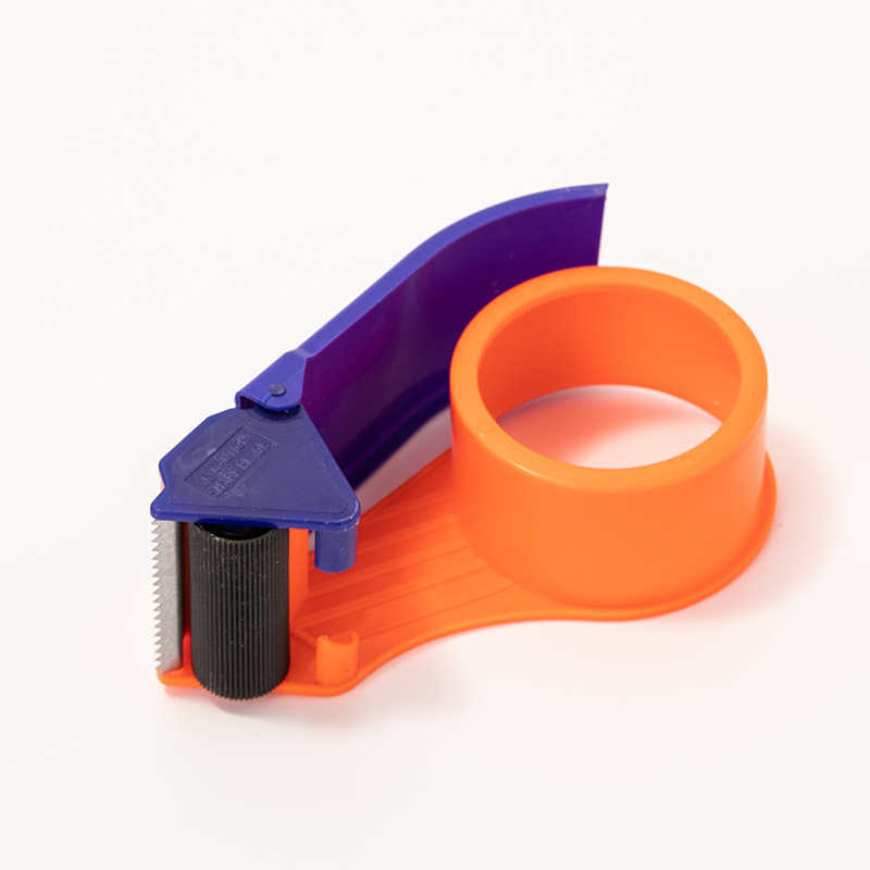 Ručni rezač trake za zatvaranje kutija — plastika; Model: 5 cm i 6 cm; Širina trake do 48 mm; Neto težina 150 g