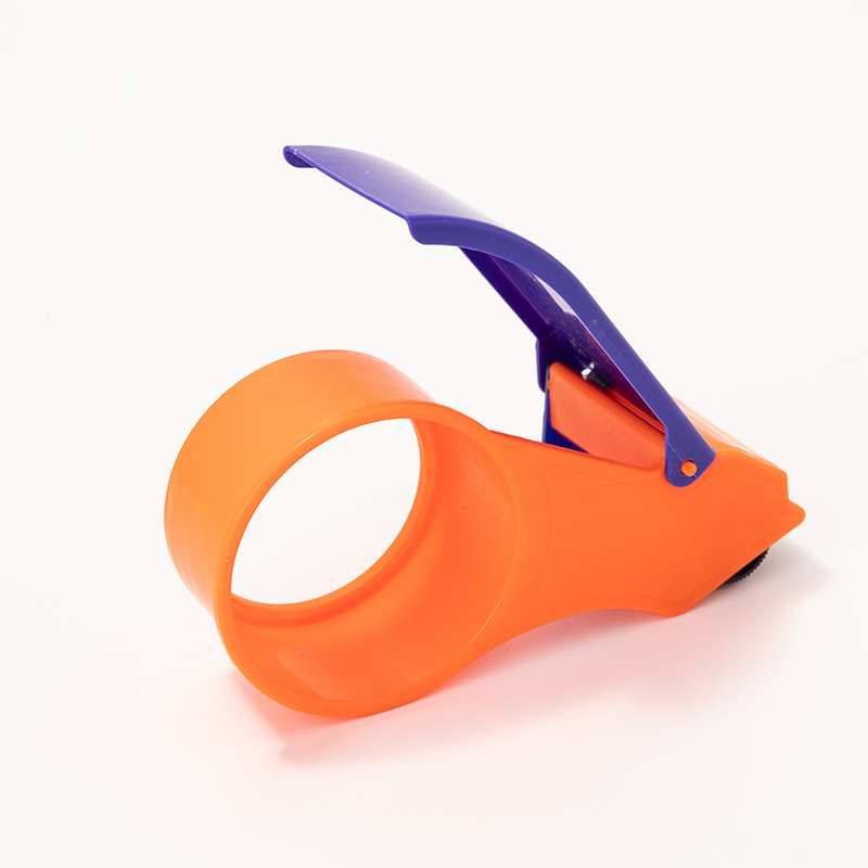 Ručni rezač trake za zatvaranje kutija — plastika; Model: 5 cm i 6 cm; Širina trake do 48 mm; Neto težina 150 g