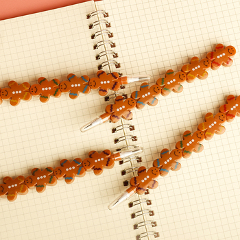 Olovka u obliku lutke, preklopna, s motivom keksa, plastičan omotač