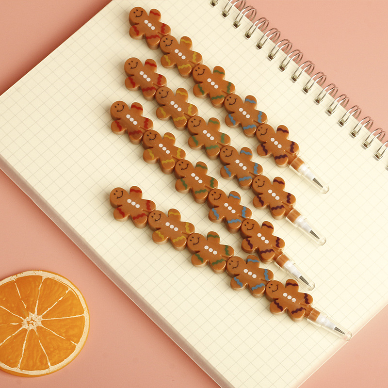 Olovka u obliku lutke, preklopna, s motivom keksa, plastičan omotač