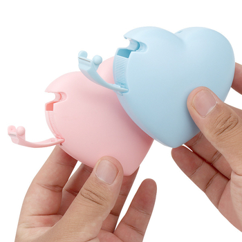 Plastična rezač za traku u obliku krofne, model Tape table; za trake širine do 20 mm, promjer osovine 25 mm, težina 35 g; ured i učenje; moguć ispis logotipa